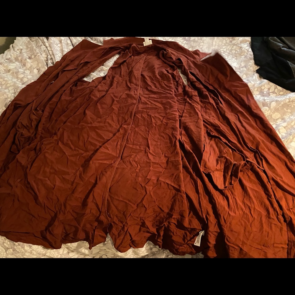 Orange no sleeves coat
